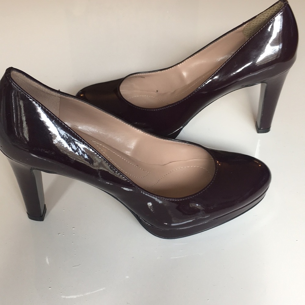 Patent leather Tahari platform pumps. Color: Wine